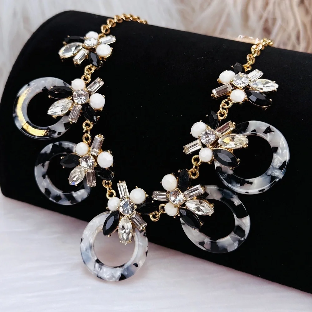 Goldtone, white and black bling statement, necklace